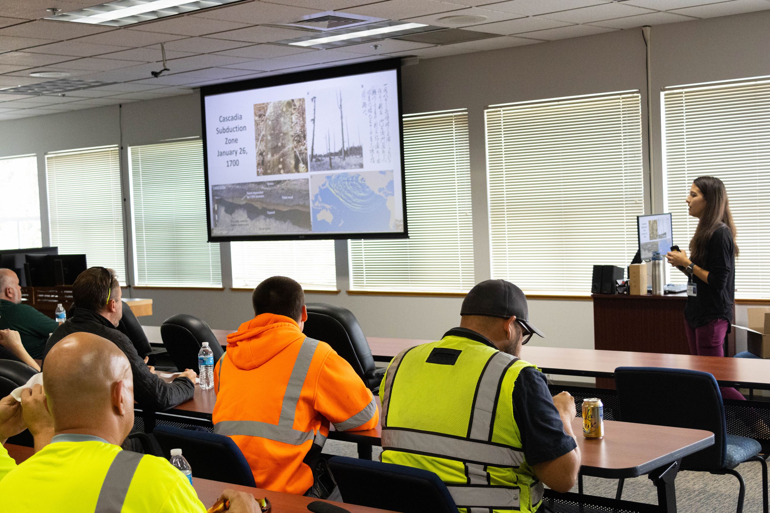 This photo shows people sitting in a preparedness class.