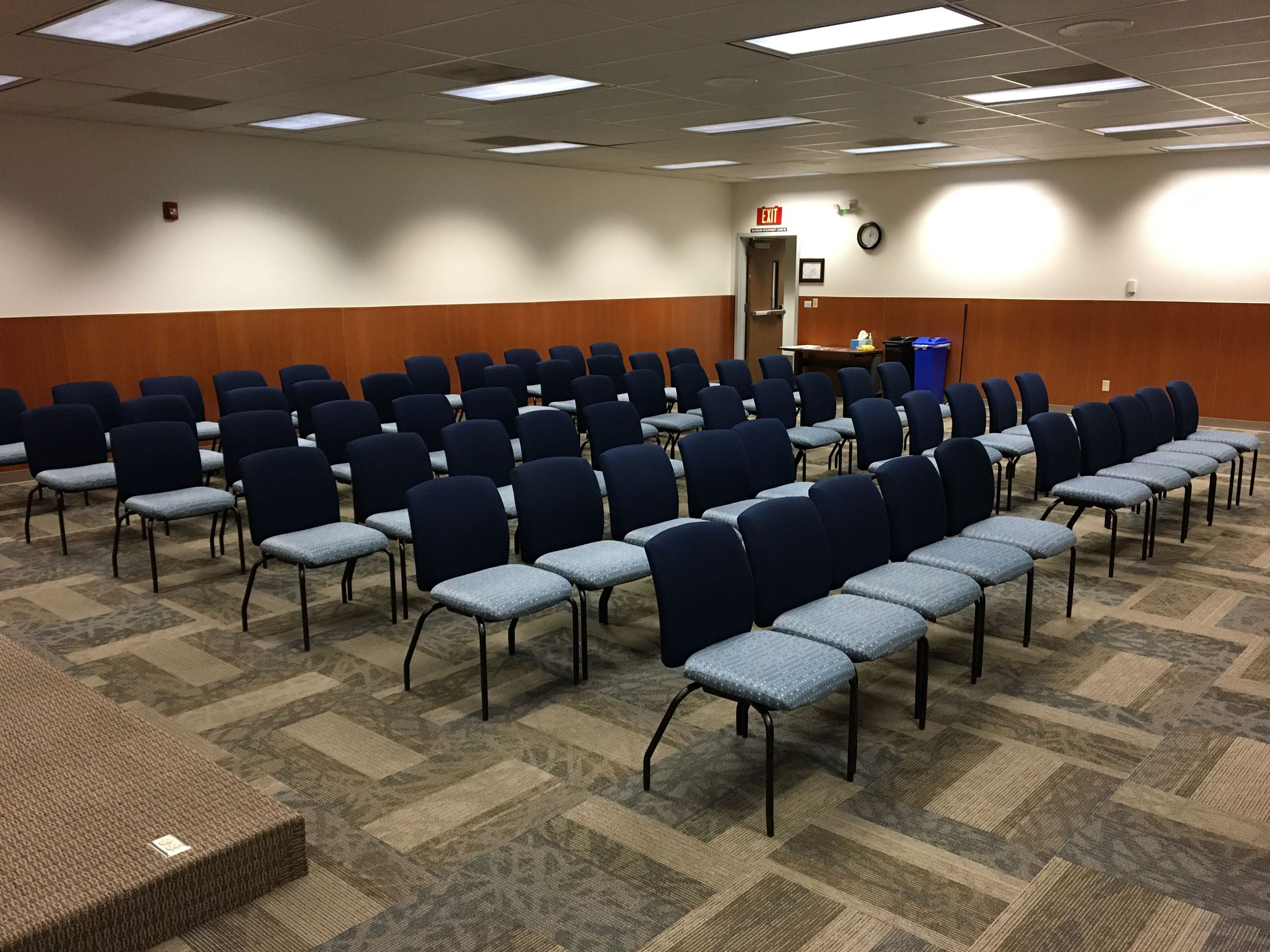 Delta Room filled with chairs lined up in sequence, from the front.