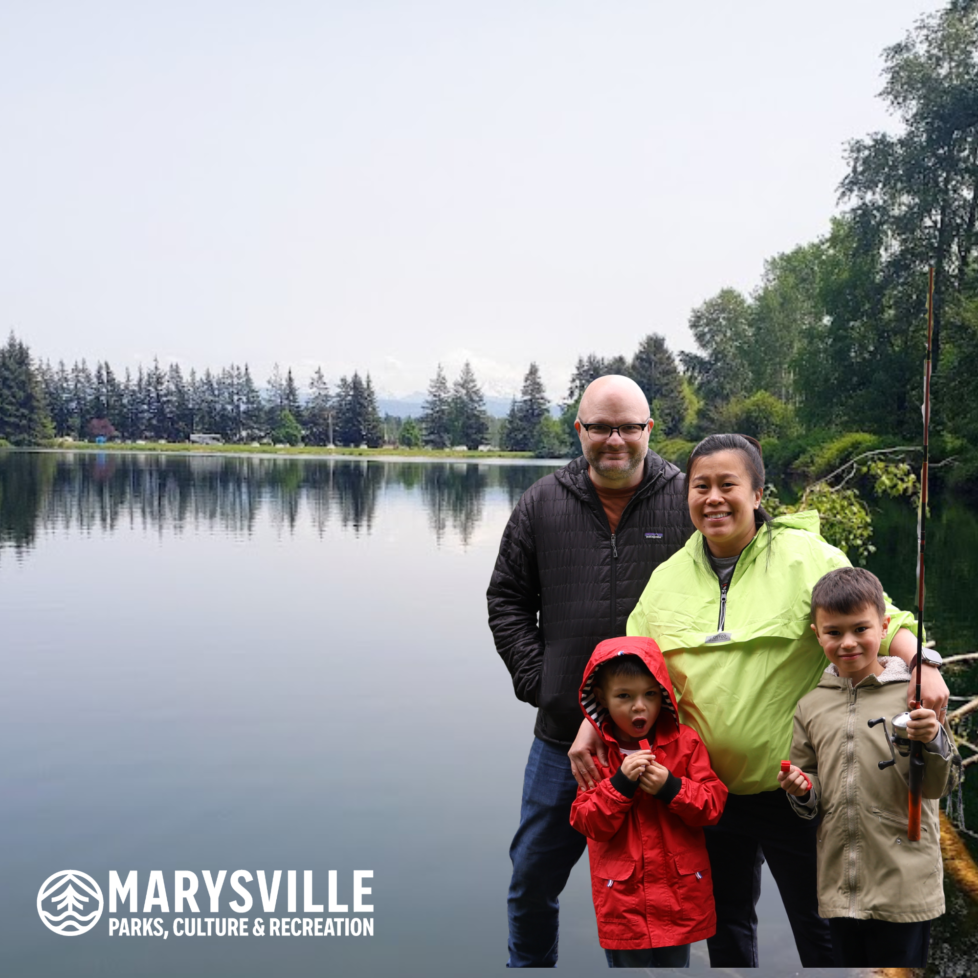 A family fishing at Twin Lakes park