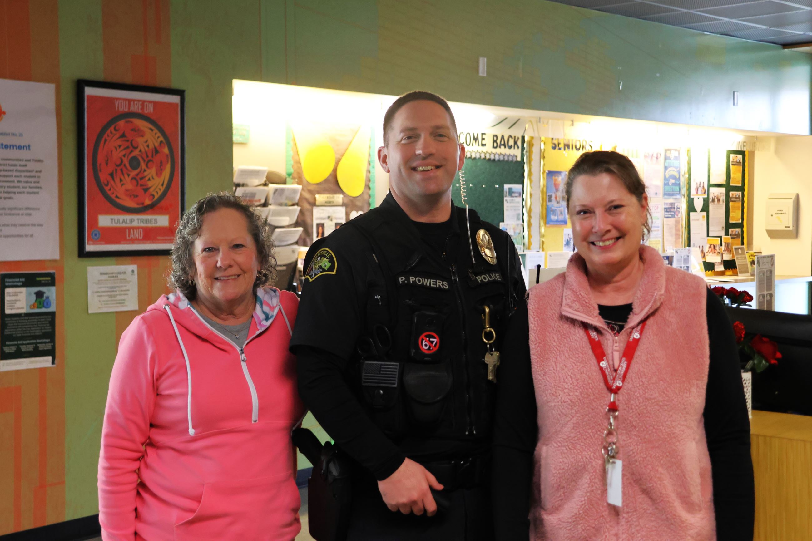 Officer Phil Powers with staff